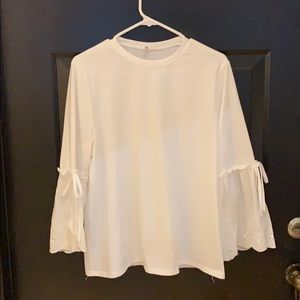 White shirt with textured sleeves